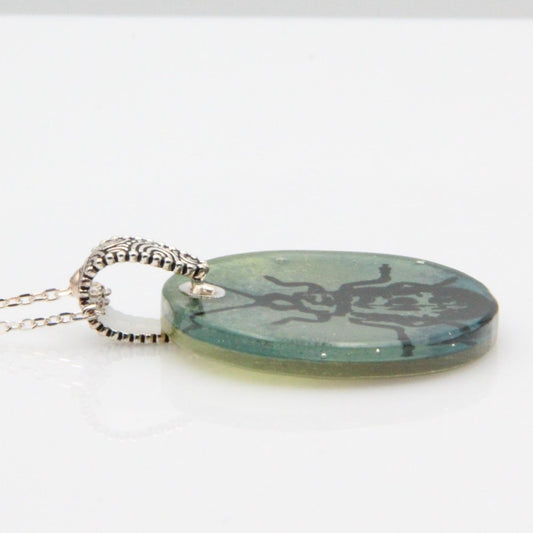 Blue and Green Beetle Glass Pendant on a Silver Chain