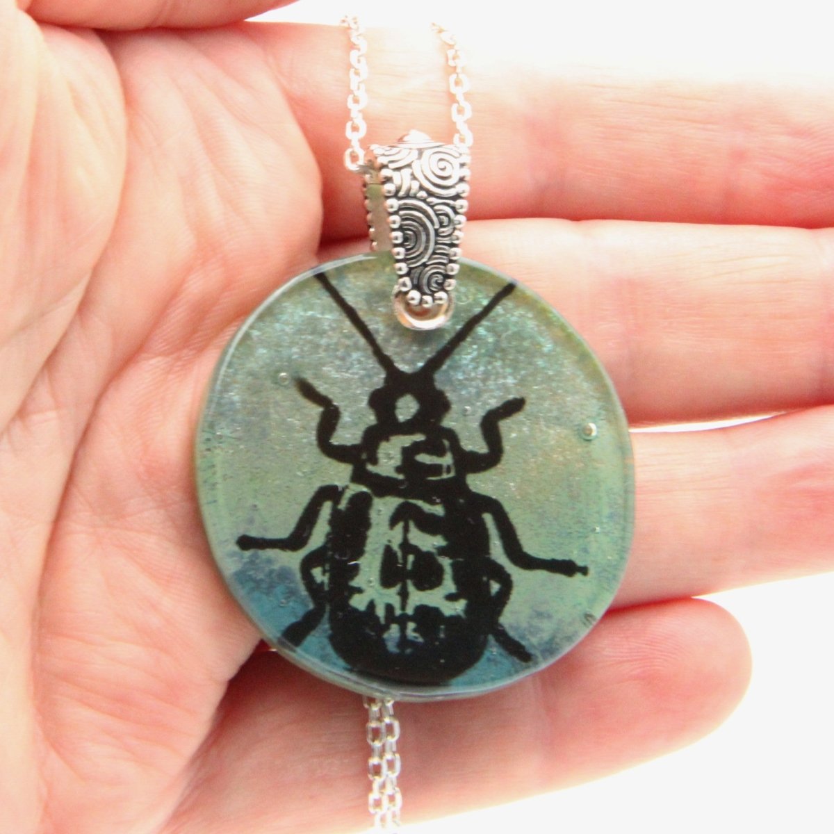 Blue and Green Beetle Glass Pendant on a Silver Chain