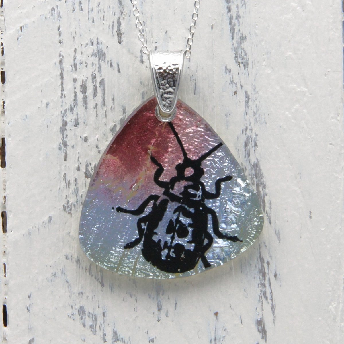Blue and Pink Beetle Glass Pendant on a Silver Chain