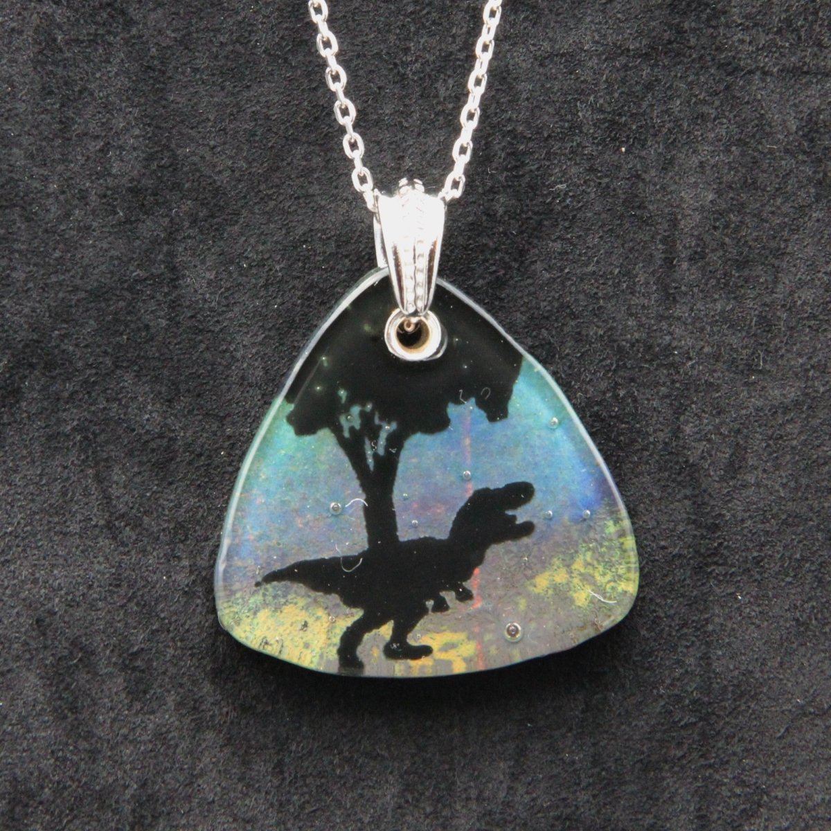 Blue Tyrannosaurus Rex Glass Pendant on a Silver Chain