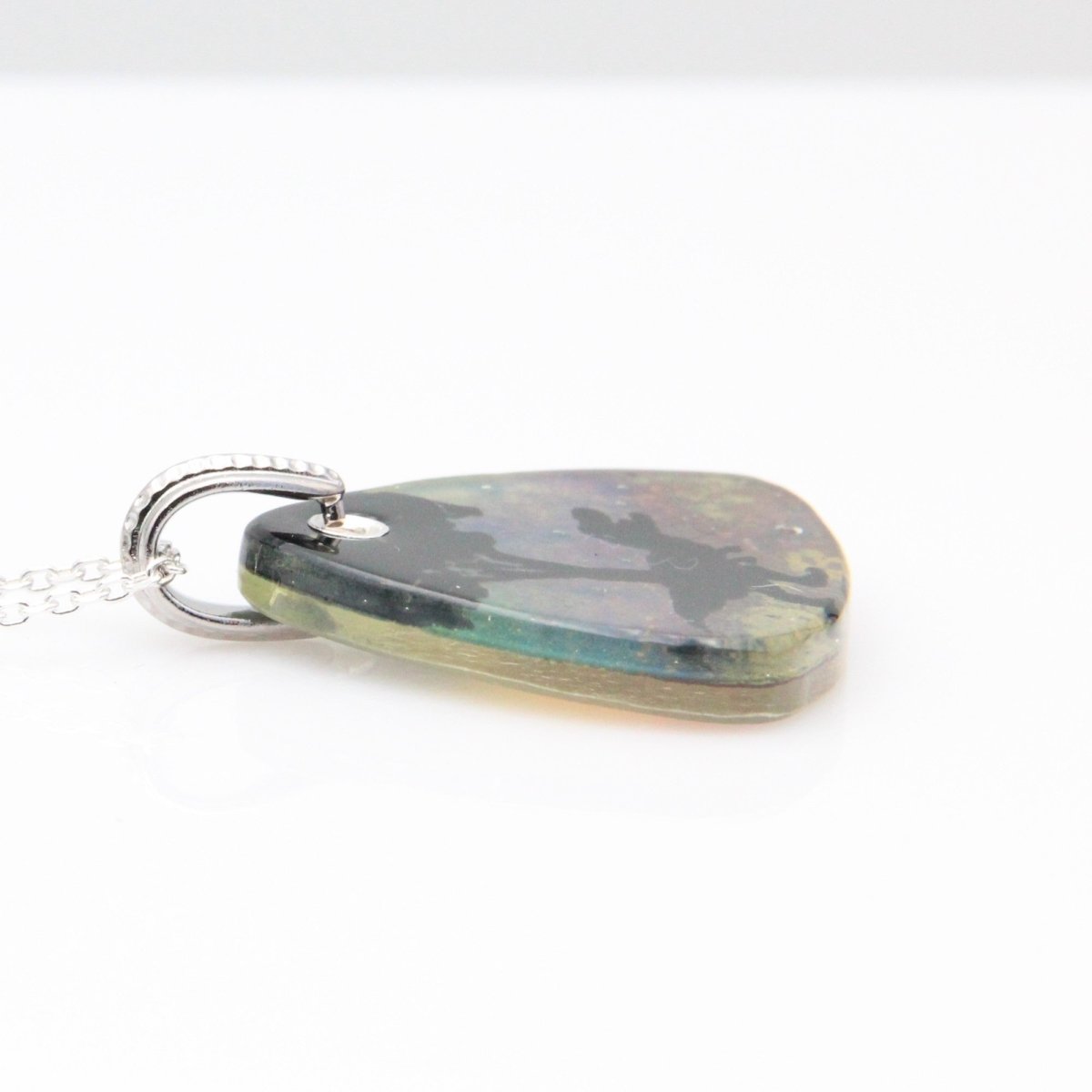 Blue Tyrannosaurus Rex Glass Pendant on a Silver Chain