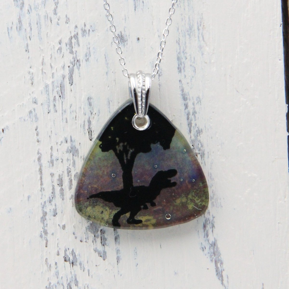 Blue Tyrannosaurus Rex Glass Pendant on a Silver Chain