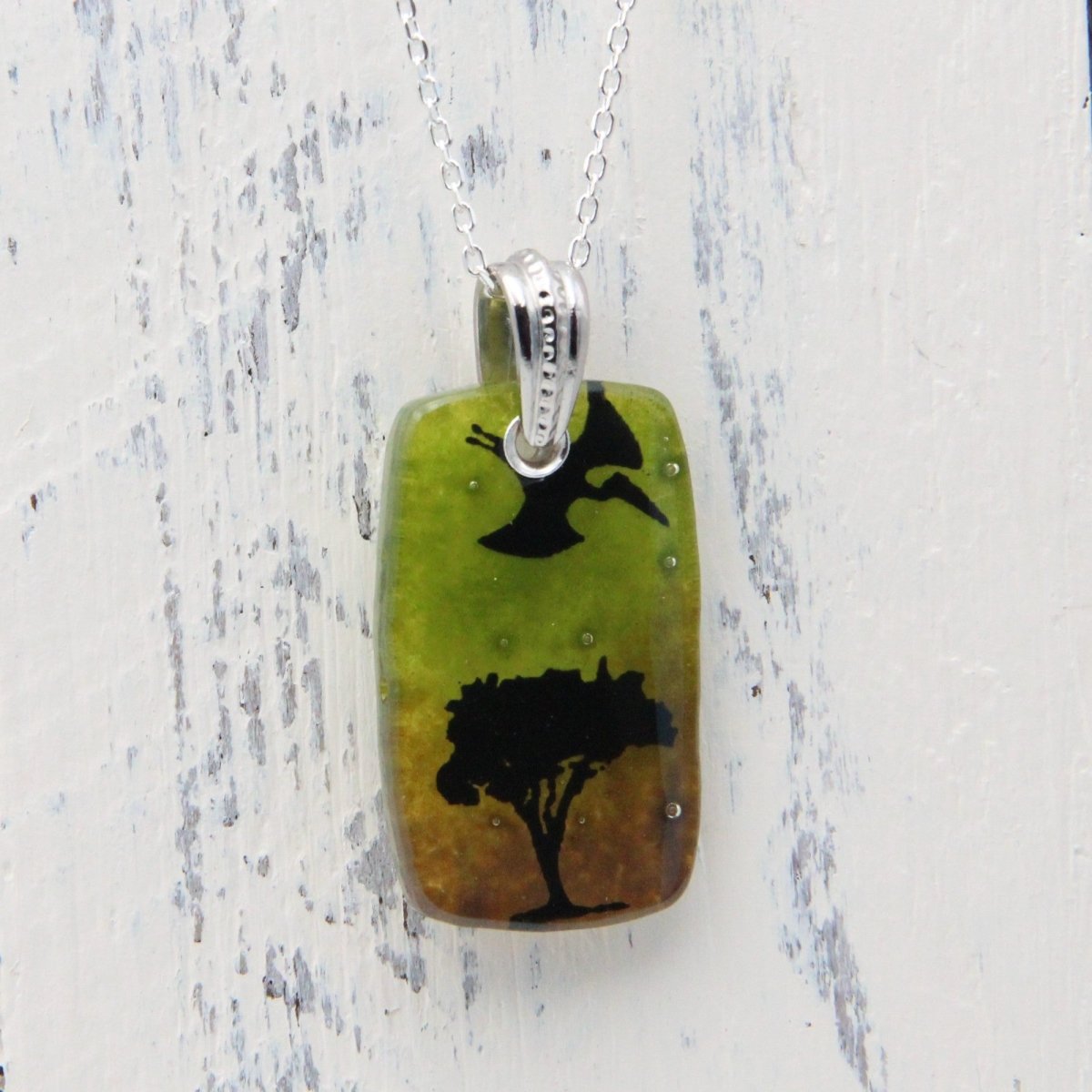 Green and Brown Pterodactyl Glass Pendant on a Silver Chain