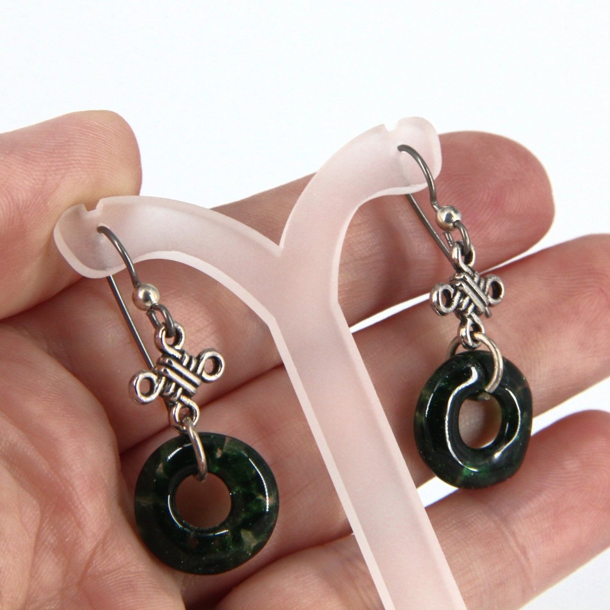 Green Glass Dangle Earrings with Silver Knot Charm