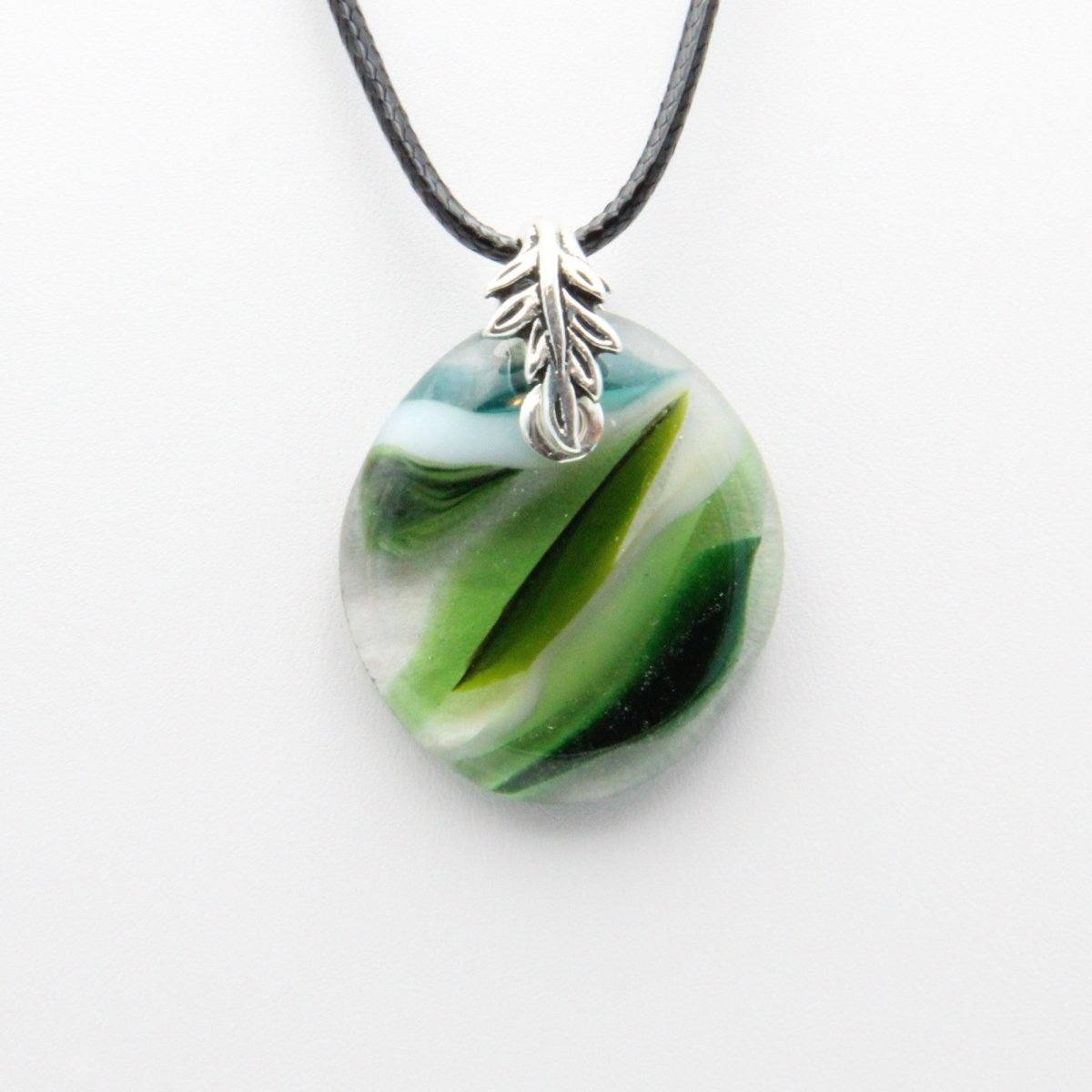 Light and Dark Green Glass Pendant with Silver Accents