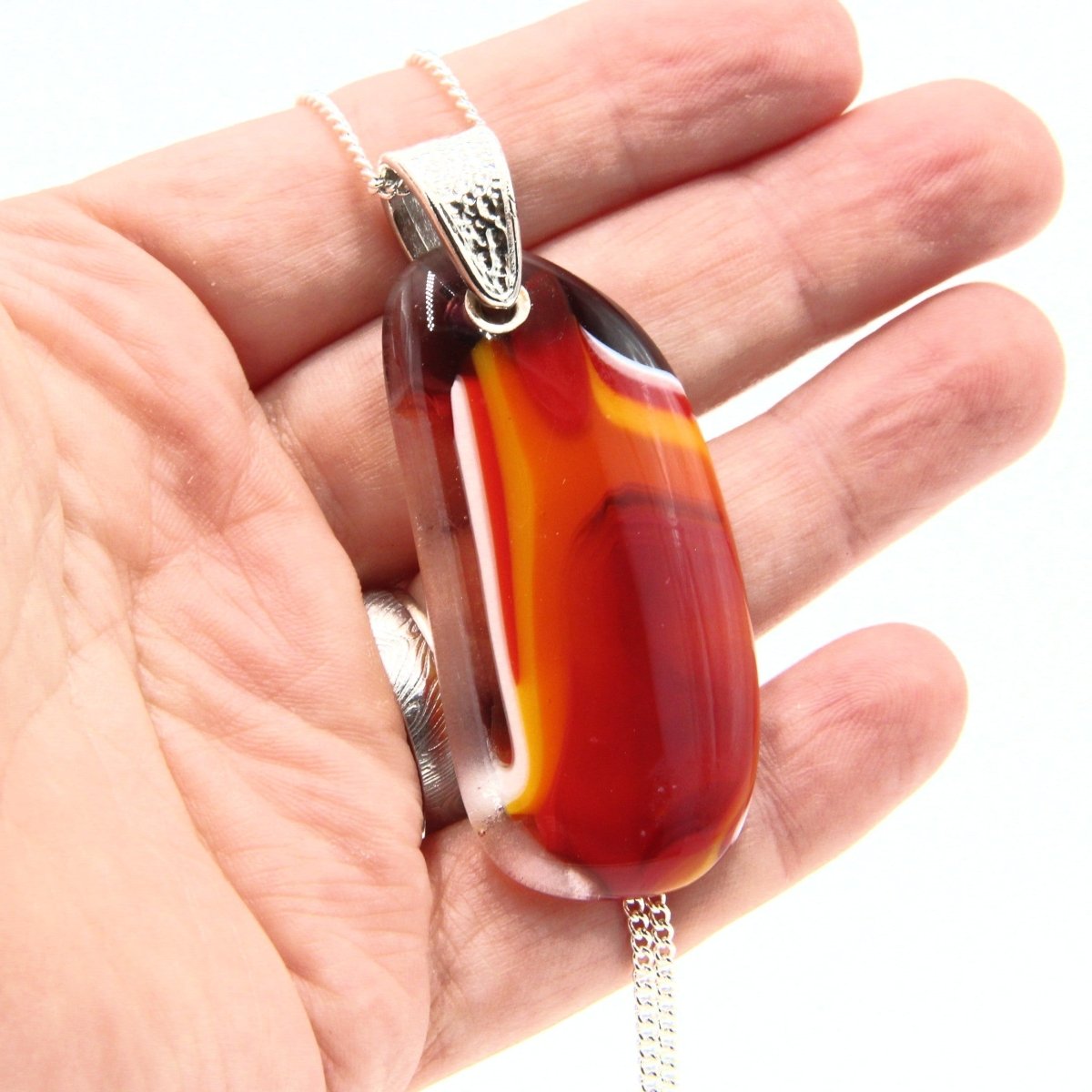 Orange Glass Pendant with Silver Accents