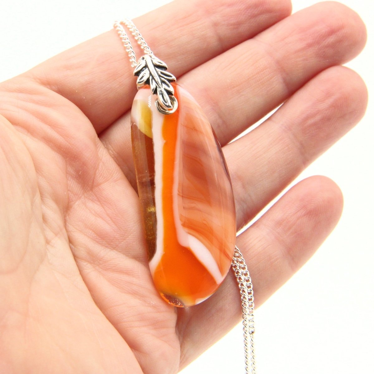 Orange Glass Pendant with Silver Accents