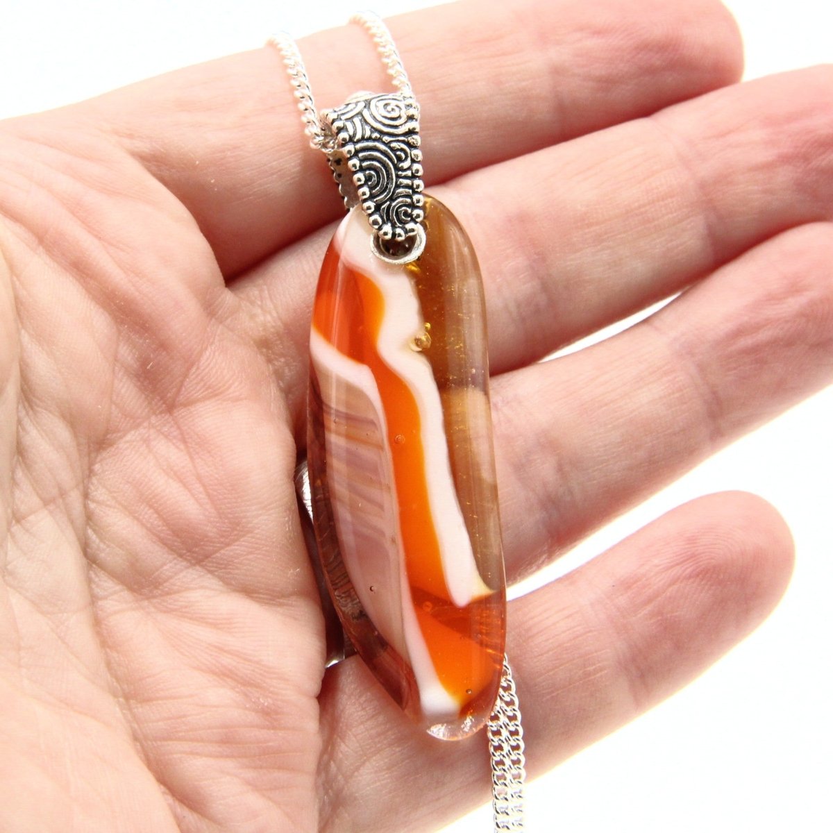 Orange Glass Pendant with Silver Accents