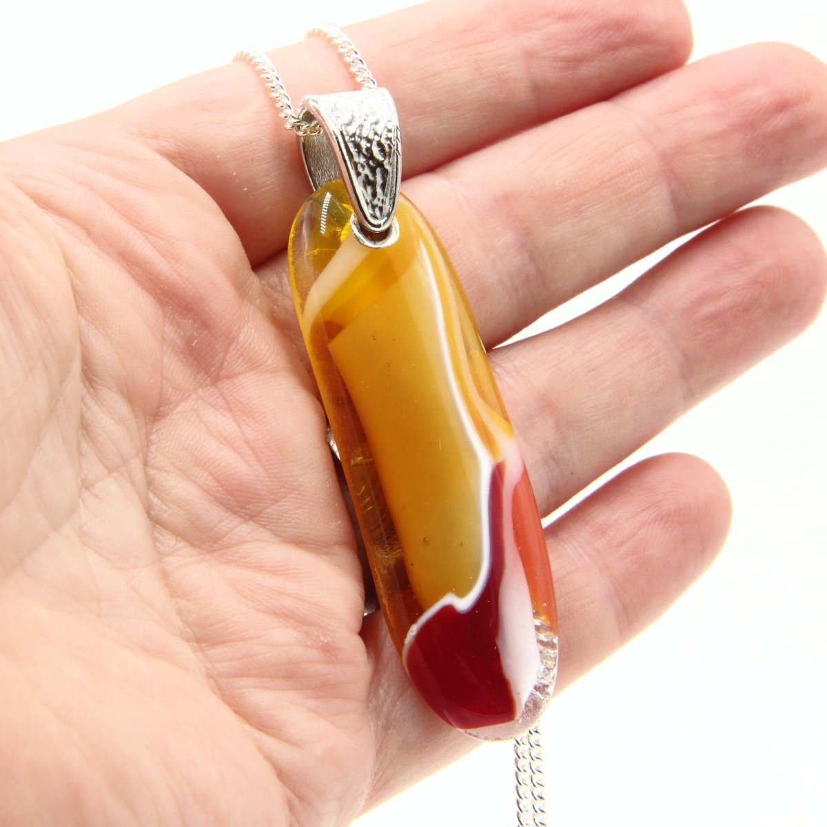 Orange Glass Pendant with Silver Accents