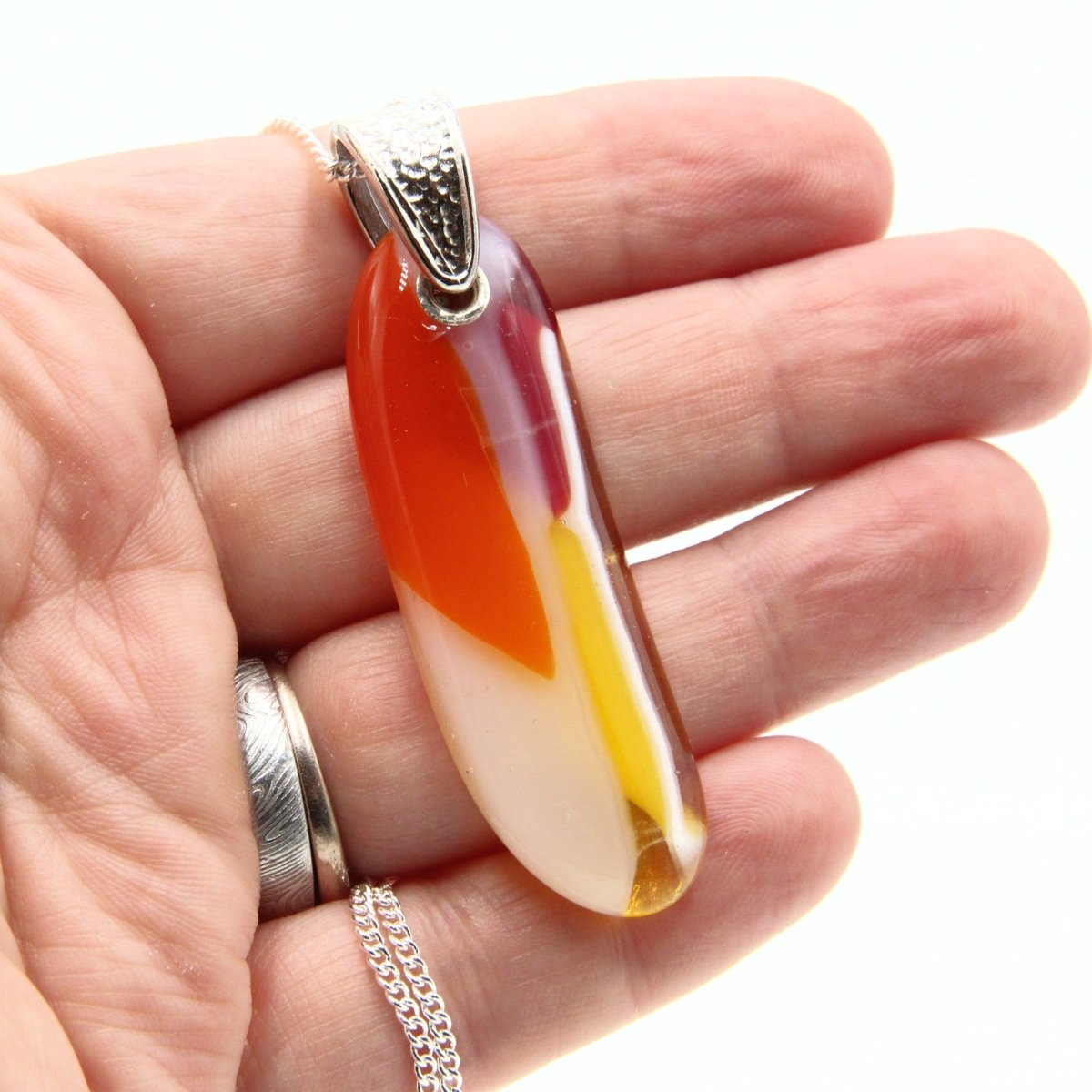 Orange Glass Pendant with Silver Accents