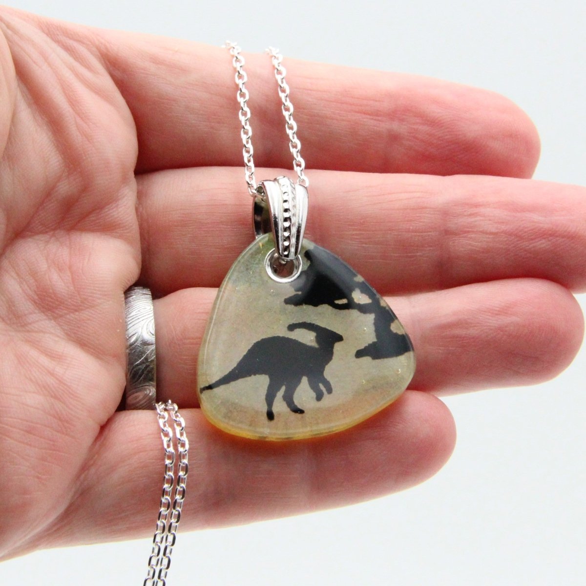 Pale Yellow Hadrosaur Parasaurolophus Glass Pendant on a Silver Chain
