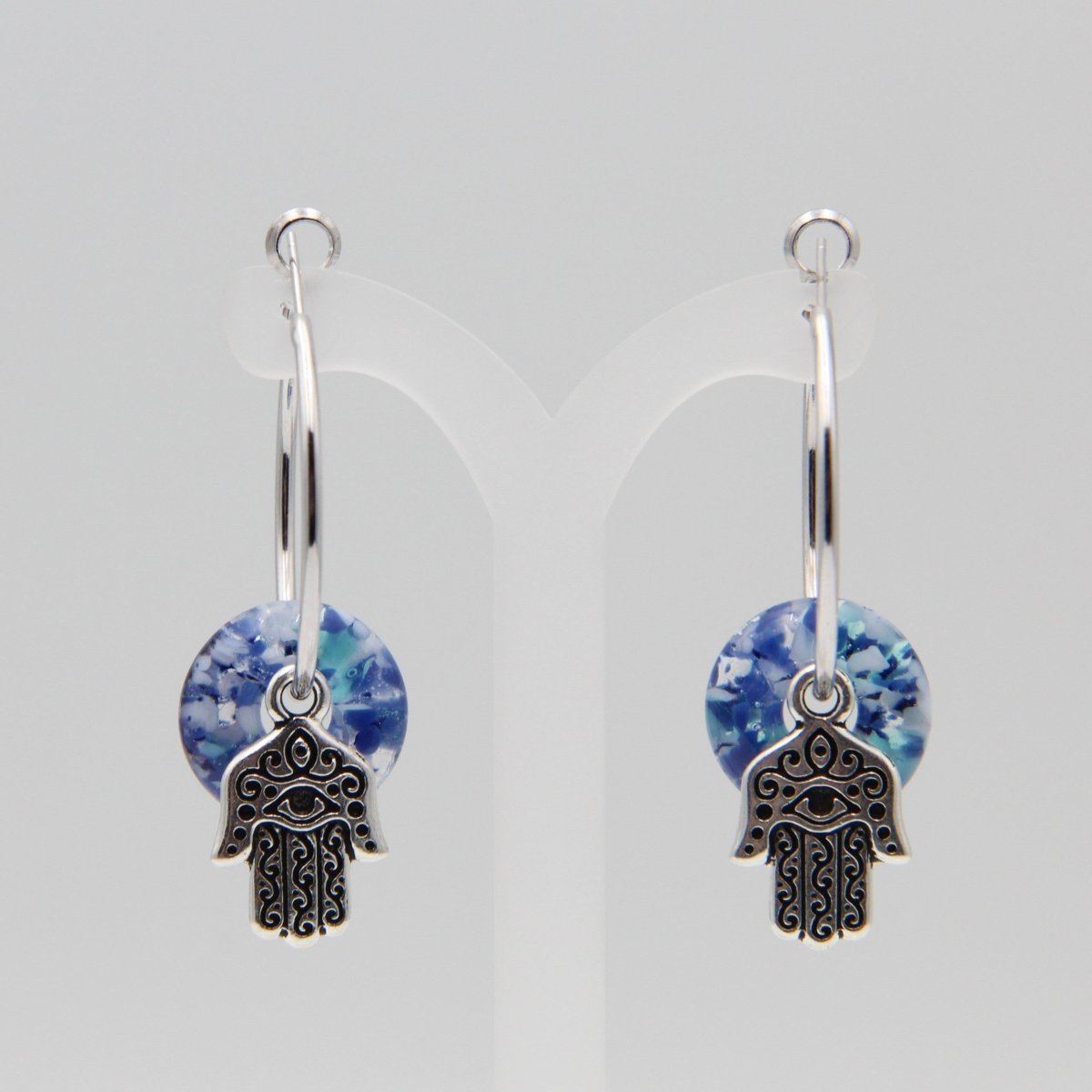 Silver Hoop Earrings with Blue Glass Donuts and Hamsa Hand Charms