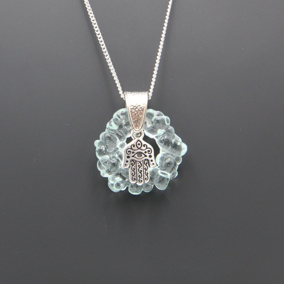 Upcycled Pale Aqua Blue Donut Necklace, Recycled Glass Pendant with Silver Hamsa Hand Charm