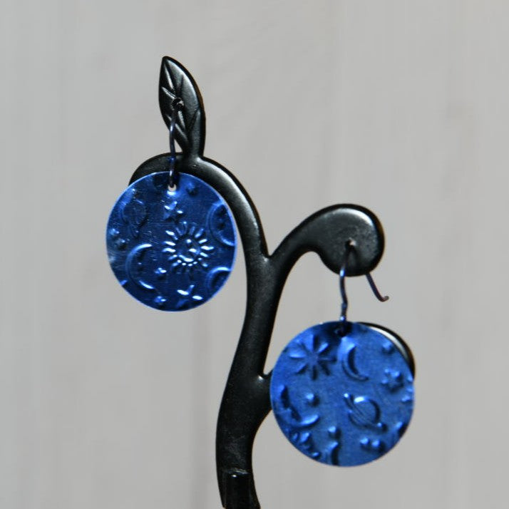 Blue Anodized Niobium Dangle Earrings with Sun and Moon Pattern