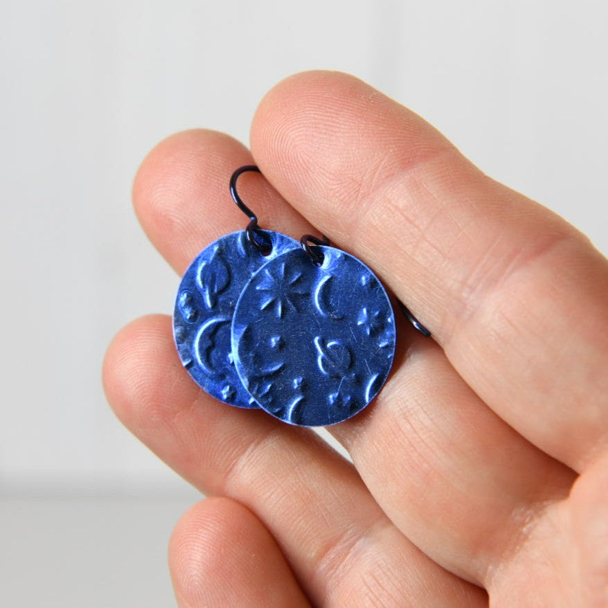 Blue Anodized Niobium Dangle Earrings with Sun and Moon Pattern