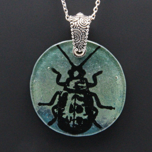 Blue and Green Beetle Glass Pendant on a Silver Chain