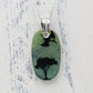 Blue and Green Pterodactyl Glass Pendant on a Silver Chain