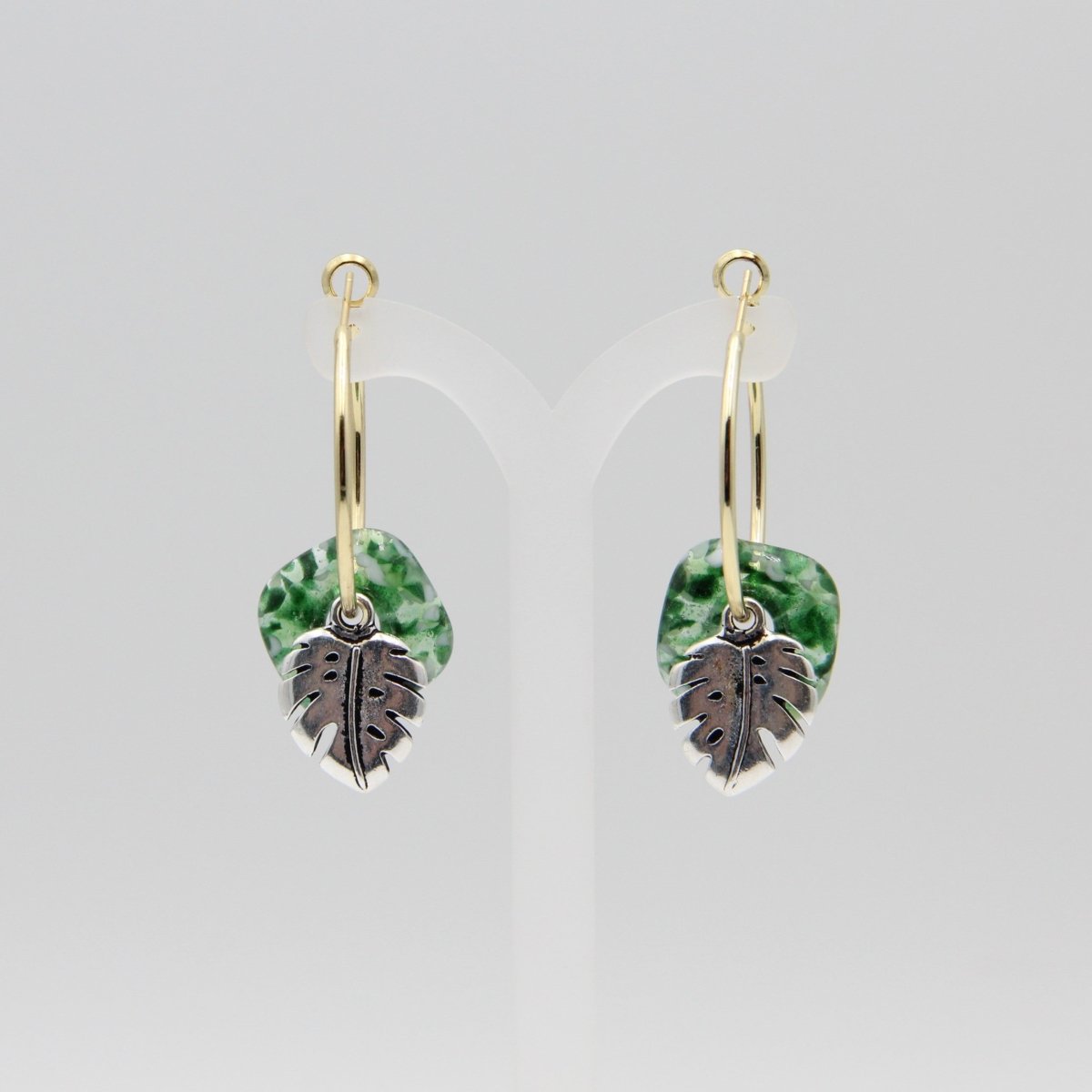 Gold Hoop Earrings with Green Glass Donuts and Monstera Leaf Charms