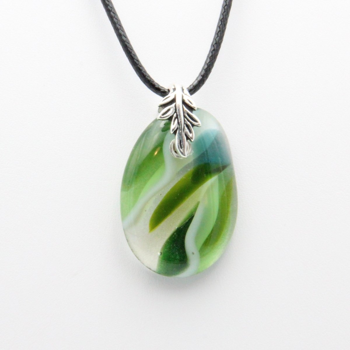 Light and Dark Green Glass Pendant with Silver Accents