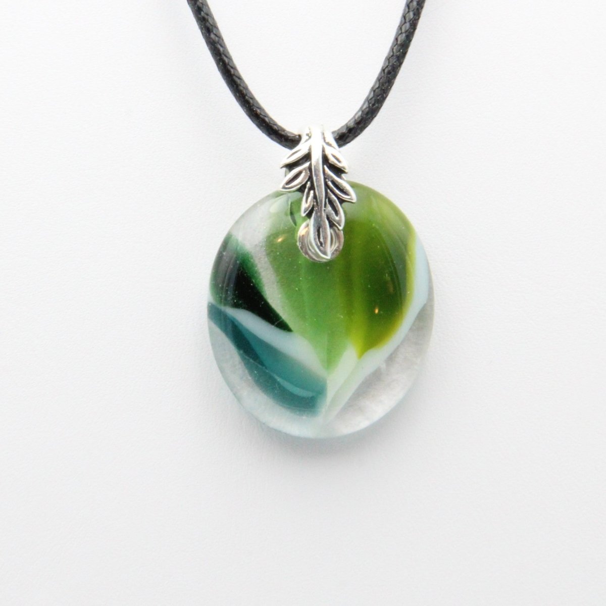 Light and Dark Green Glass Pendant with Silver Accents