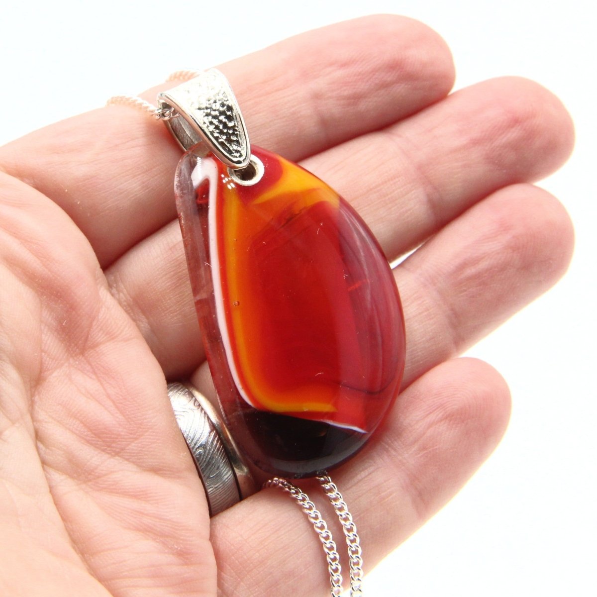 Orange Glass Pendant with Silver Accents