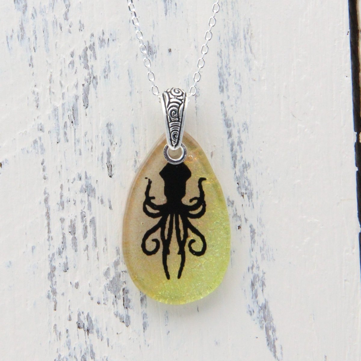 Pale Yellow Squid or Kraken Glass Pendant on a Silver Chain