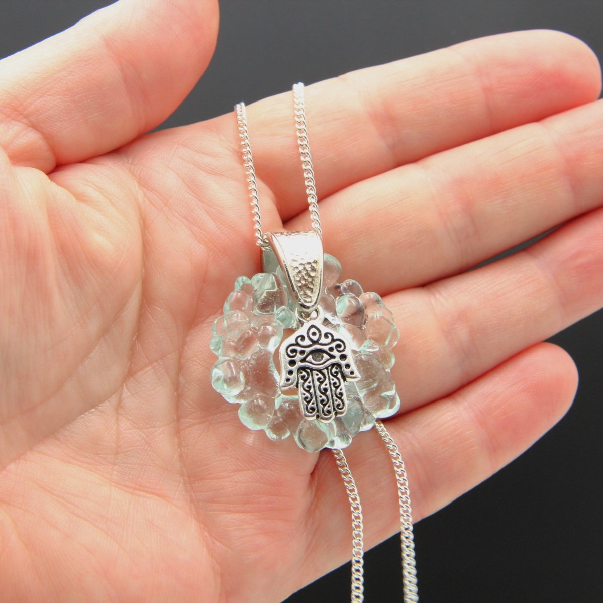 Upcycled Pale Aqua Blue Donut Necklace, Recycled Glass Pendant with Silver Hamsa Hand Charm